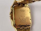 an image of a close up of a wrist watch on a white surface