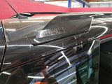 a car that has a sticker on the roof of it
