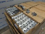 several boxes of metal parts are stacked on top of each other