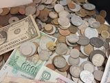 a pile of money sitting on top of a table