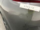 a sticker that says vauto on the back of a car