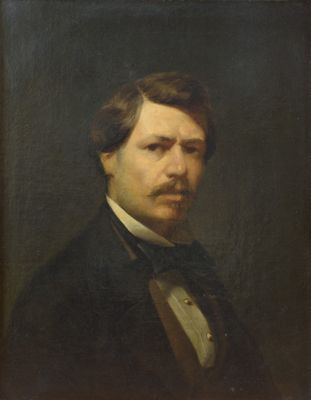 portrait of a man in a black suit and bow tie