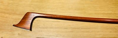 a close up of a wooden handle on a table