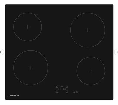 a black stove top with four burners and four knobs