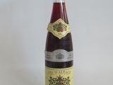 a bottle of wine that is sitting on a table