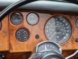 steering wheel of a car with gauges and gauges on the dashboard