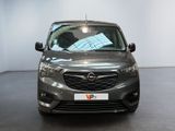 the front view of a grey opel parked in a showroom