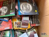 a box full of books and a saw blade