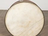 a large drum sitting on the floor in a room
