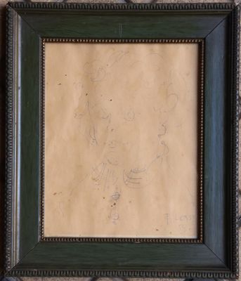 drawing of a man with a beard and mustache in a green frame on a wall