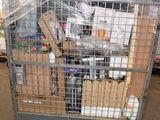 a metal cage with a bunch of items inside of it