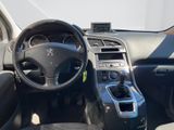 the interior of a car with a steering wheel, dashboard and dashboard controls