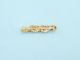 an image of a gold plated hair clip on a blue background