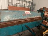 a machine that is sitting inside of a building