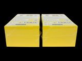 two yellow boxes are stacked on top of each other on a black background