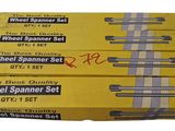 three boxed boxes of wheel spanner set on a white background