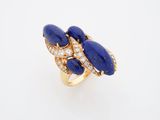 an 18k gold, lapis and diamond ring