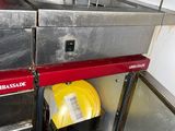 an image of a commercial kitchen with a stove and a dishwasher