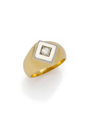 a gold and diamond signet ring
