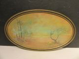 an image of a picture of a painting on a table
