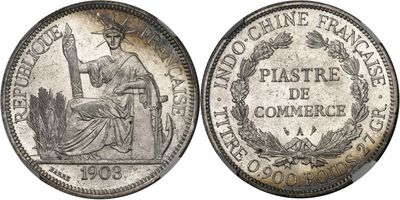 a silver coin with the image of a woman sitting on top of it