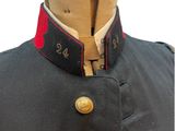 a close up of a military uniform on a mannequin dummy