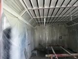 a picture of a room that is covered in plastic