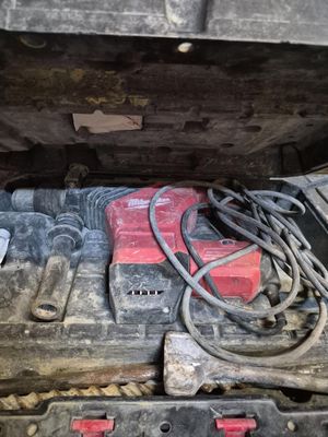 many tools in the trunk of a vehicle