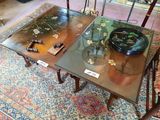a glass table with a clock on it and a vase with flowers on it