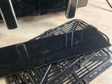 a black stove top oven sitting on top of a wooden table