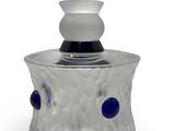 gray and blue glass jar with a white top and a black base