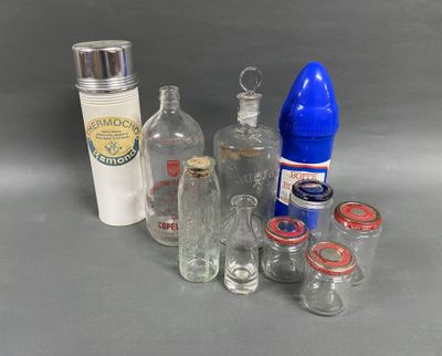 many bottles and containers that are sitting on a table