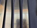 six silverplated knives and six spoons on a blue cloth