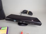 an image of a video game system and accessories