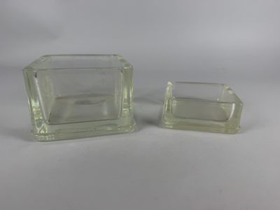 pair of clear glass vases on a white background