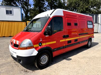 an image of a red and white van parked in a parking lot