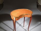 a small table that is sitting in the middle of a room