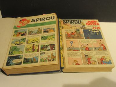 two books that are open on a table