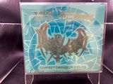 a picture of a pokemon trading card on a stand