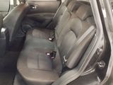 the interior of a car with the front seats folded down