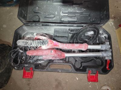 a tool in a case that is sitting on the floor