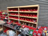 many different tools on the shelves in the garage