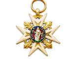 gros plan d'une médaille sur fond blanc
