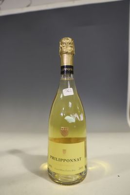 a bottle of wine that is sitting on a counter