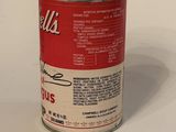 a can of soup that is sitting on a table
