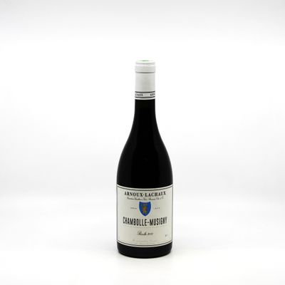 a bottle of wine that is sitting on a table