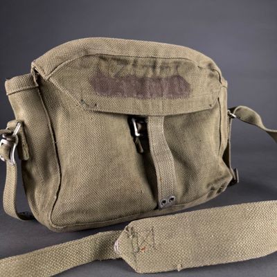 an image of a bag with a strap on it