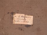 a piece of paper that has been left on the floor