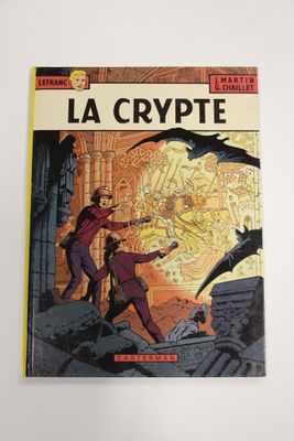 On voit la couverture de la bande dessinée « La Crypte ».