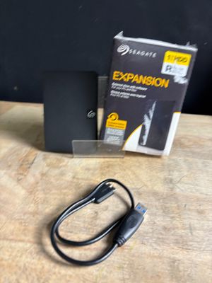 a box and a charger sitting on a table